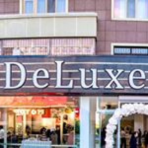 Магазин одежды De Luxe в Шымкенте